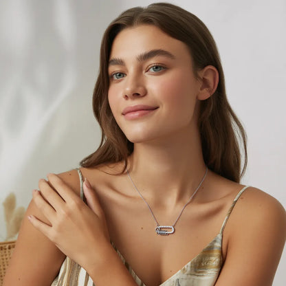 Model wearing the Glambodycandy Eternity Link silver 316L stainless steel carabiner necklace, a trendy piece of modern jewelry