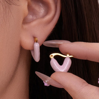 Close-up detail showing the secure click-top clasp mechanism and the thickness of the 18K gold plating.