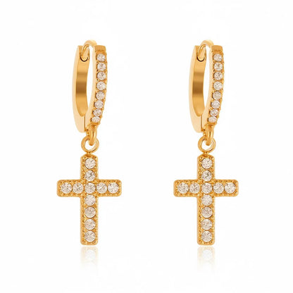 Grace Pavé Cross Huggie Hoops in 18k gold with full zirconia sparkle.