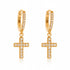 Grace Pavé Cross Huggie Hoops in 18k gold with full zirconia sparkle.