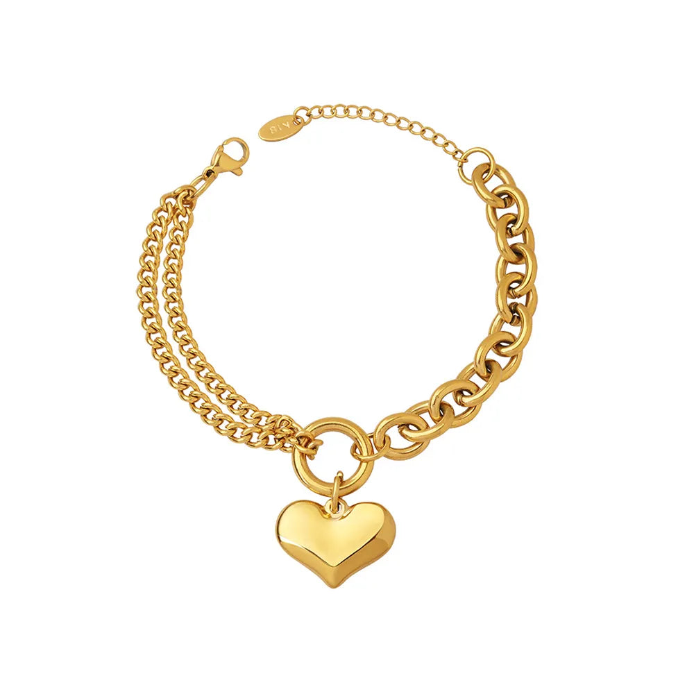 18K gold plated 316L stainless steel bracelet with a puffy heart charm and mixed Cuban link chains on a white background.