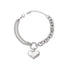 Polished 316L stainless steel bracelet with a puffy heart charm and mixed Cuban link chains.