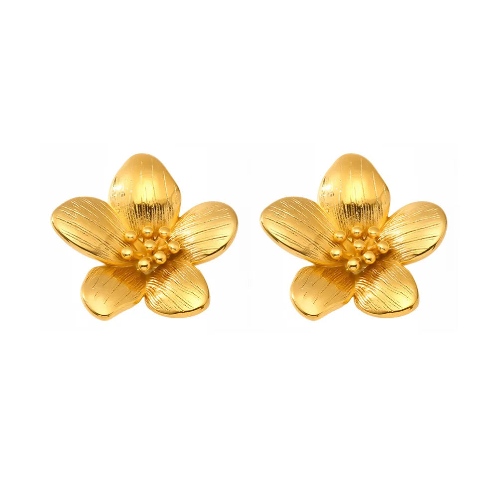Pair of 18k gold Helia Statement Flower Studs with detailed brushed petals