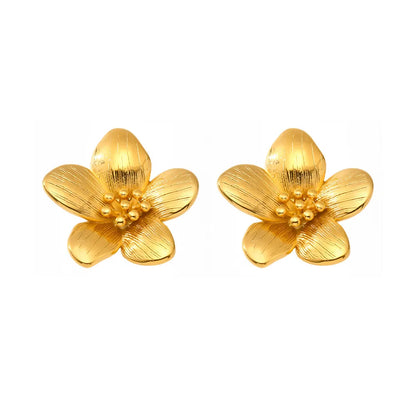 Pair of 18k gold Helia Statement Flower Studs with detailed brushed petals