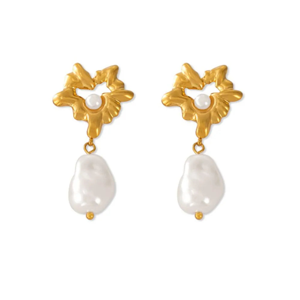 18K gold plated drop earrings with a heart-shaped imitation pearl charm on a white background.