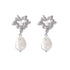 hepburn-heart-pearl-drop-earrings-silver-white-background.webp