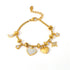 The Lennox Pavé Heart Bracelet in 18k gold plate, featuring a chunky curb chain and a sparkling zirconia heart, on a white background