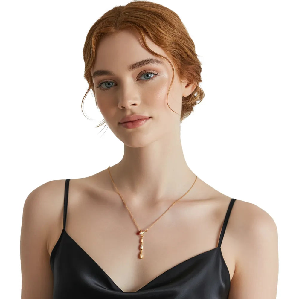 Model wearing the gold Liquid Drop S925 Silver Necklace, highlighting the pendant length and layered look.