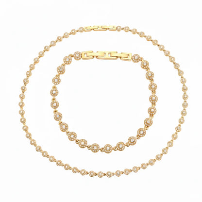 The complete Lucia Zirconia Necklace and Bracelet Set in a radiant 18k gold plated finish.