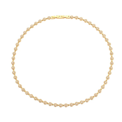A close-up of the Lucia Zirconia Necklace in 18k gold plate, showing the brilliant round-cut stones