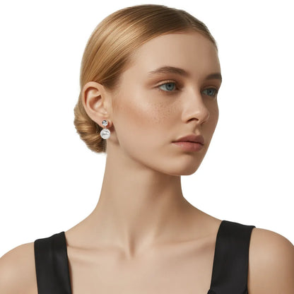 Model wearing the Lunar Sphere Dangle Stud Earrings in S925 sterling silver.