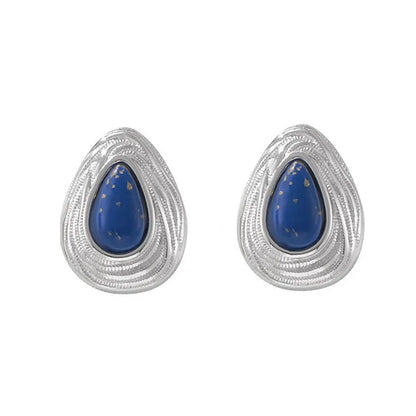 Pair of Lyra Goldstone Stud Earrings in polished 316L stainless steel.