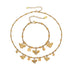 Overview of the Melia Bee & Clover Charm Necklace and Bracelet set in 18k gold.