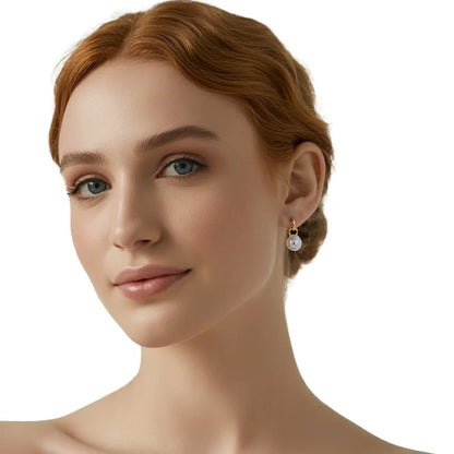Close-up of model wearing S925 silver beaded pearl stud earrings with a pearl drop