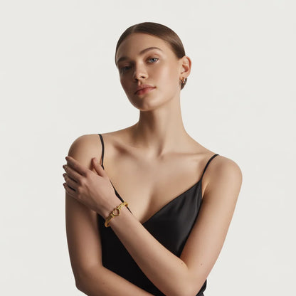 A close-up of the Harlow Chunky Heart Bracelet on a model&