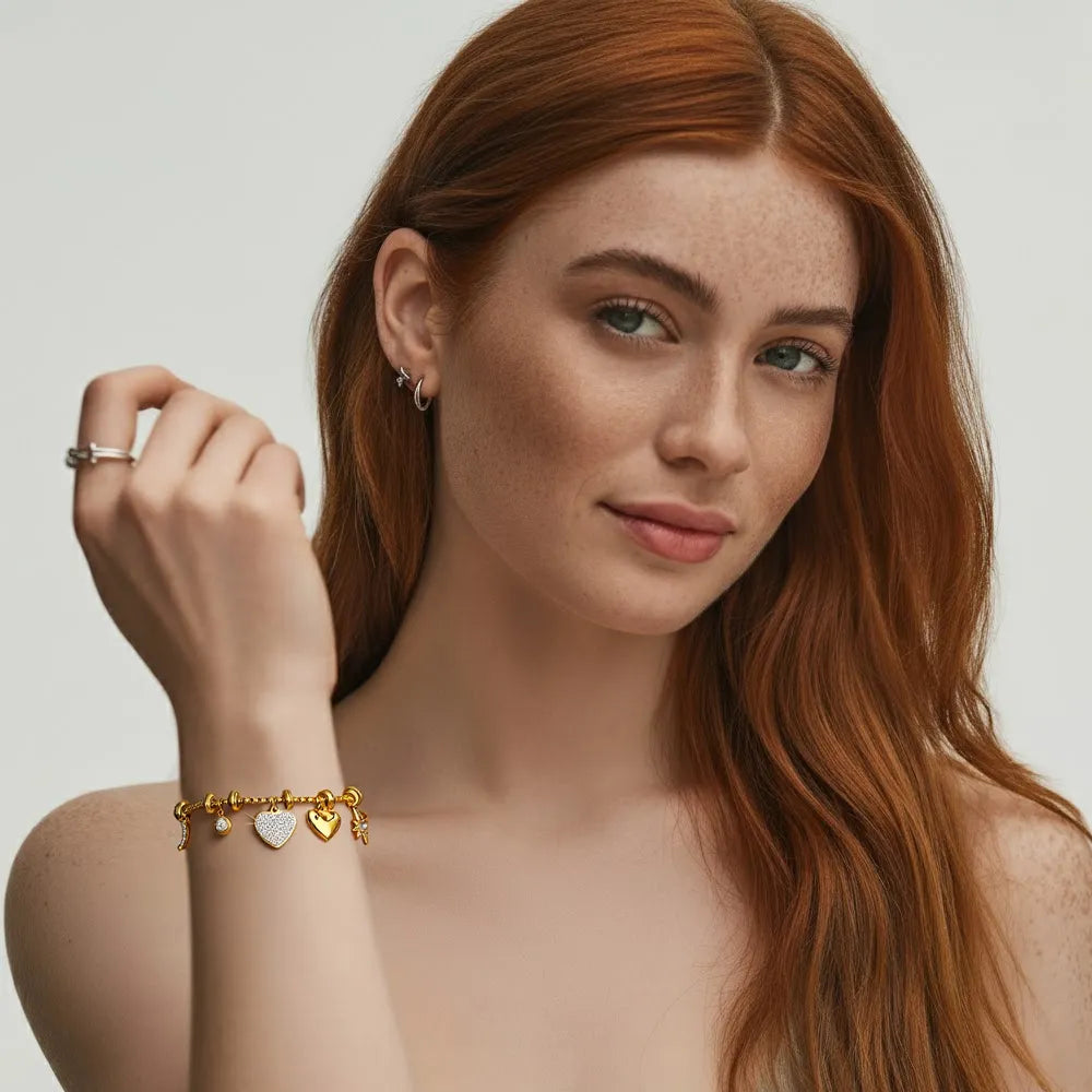 A model wearing the bold, 18k gold plated Lennox Pavé Heart Bracelet, showcasing its modern street-style look.