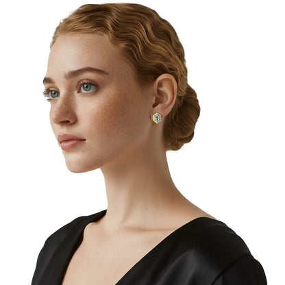 Model showcasing the side profile of the S925 Blue Topaz Hexagon Studs, highlighting the vintage texture and secure fit