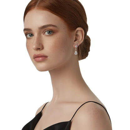 Model wearing elegant S925 teardrop zirconia dangle earrings, highlighting the fluid movement and delicate design.