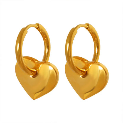 18K gold plated hoop earrings with a dangling puffy heart charm on a white background