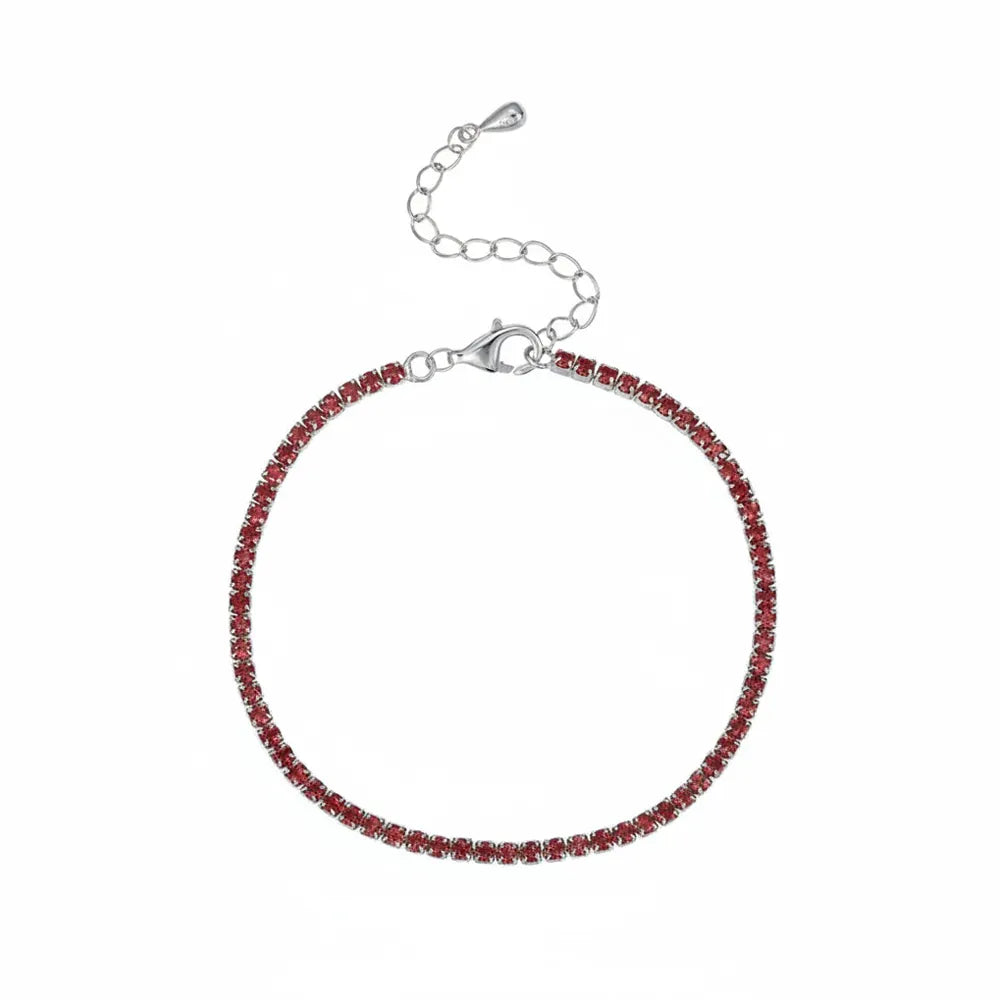 Studio shot of the S925 gold-plated tennis bracelet set with sparkling red zirconia stones.