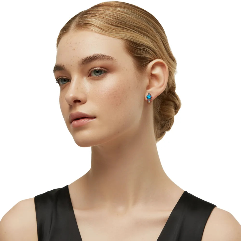Model showcasing the S925 Blue Star Huggie Hoop Earrings in a front-facing view.