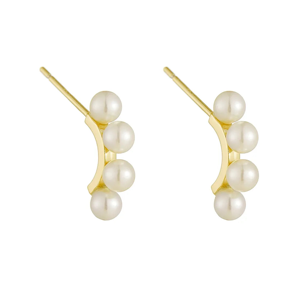 S925 sterling silver stud earrings plated in gold, featuring a curved bar design set with four small white pearls.