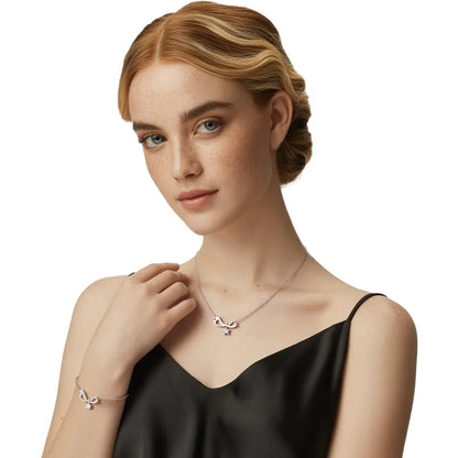 Model wearing the S925 Silver Pavé Infinity Bow Set, showcasing both the necklace and bracelet