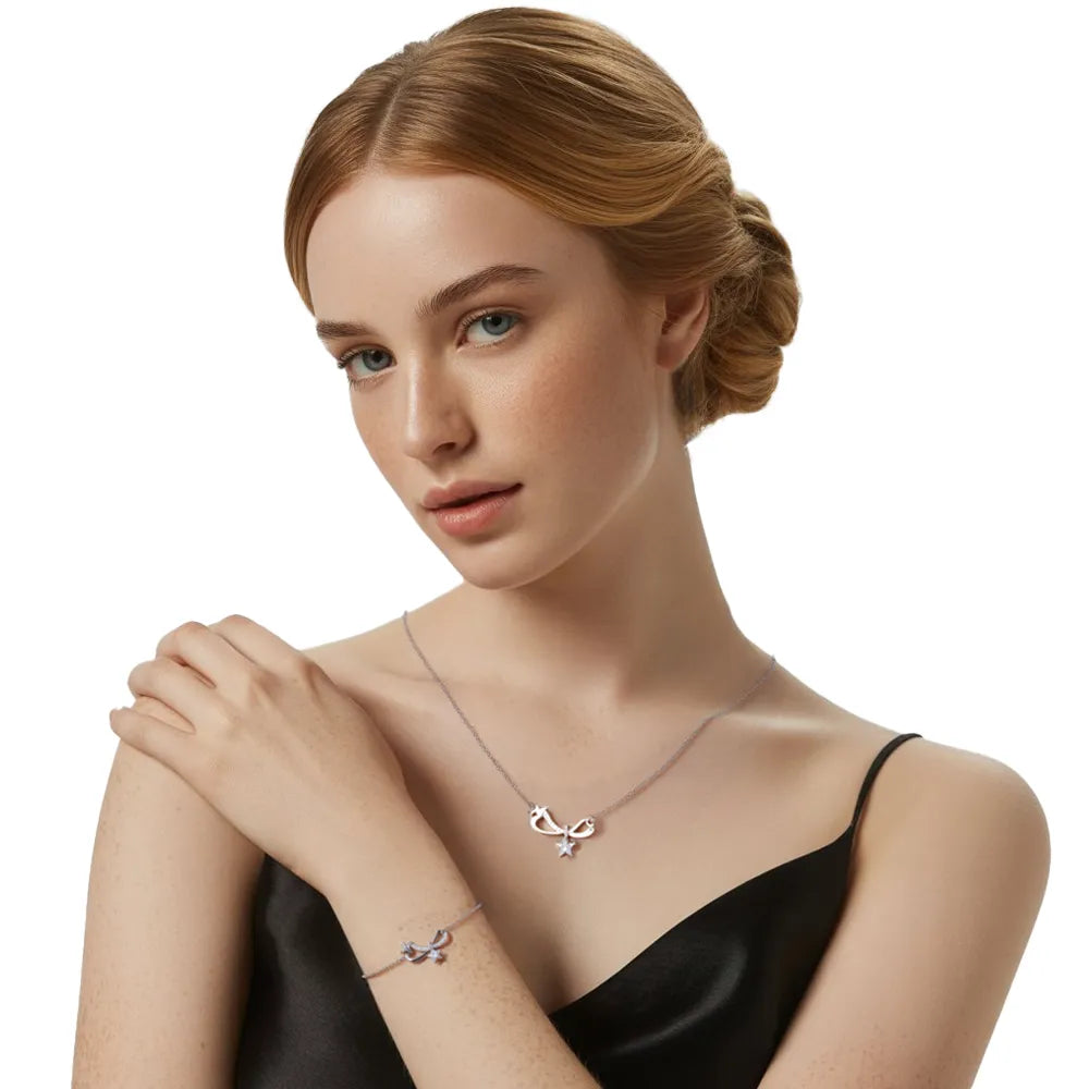 Model showcasing the S925 Silver Pavé Infinity Bow Set from a side profile.