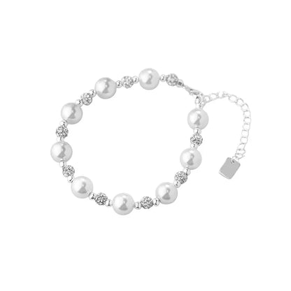 S925 sterling silver bracelet featuring genuine pearls and sparkling pavé cubic zirconia beads on a white background.