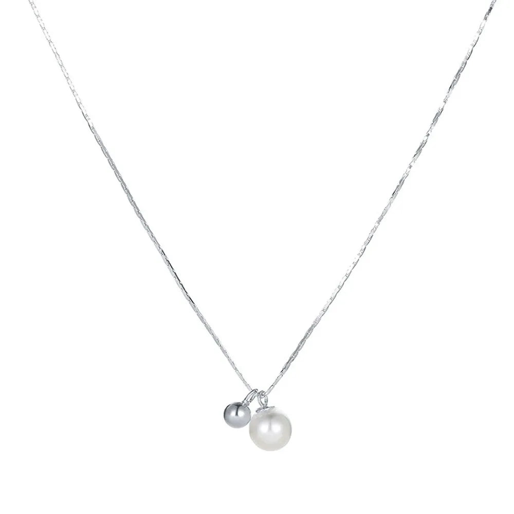 Minimalist S925 sterling silver necklace featuring a genuine freshwater pearl and a round silver bead pendant