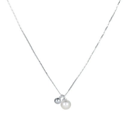 Minimalist S925 sterling silver necklace featuring a genuine freshwater pearl and a round silver bead pendant