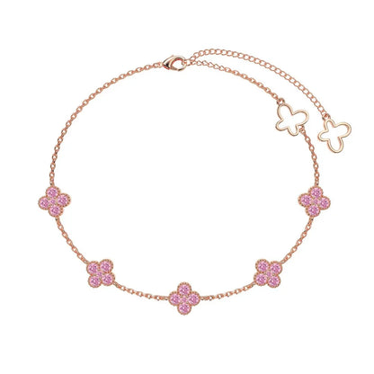 S925 sterling silver station bracelet featuring pink crystal clover charms in a rose gold tone