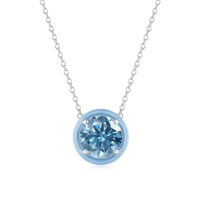Minimalist silver necklace with a blue round cubic zirconia and matching blue rim.