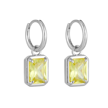 S925 sterling silver huggie earrings with a radiant canary yellow rectangular drop on a white background