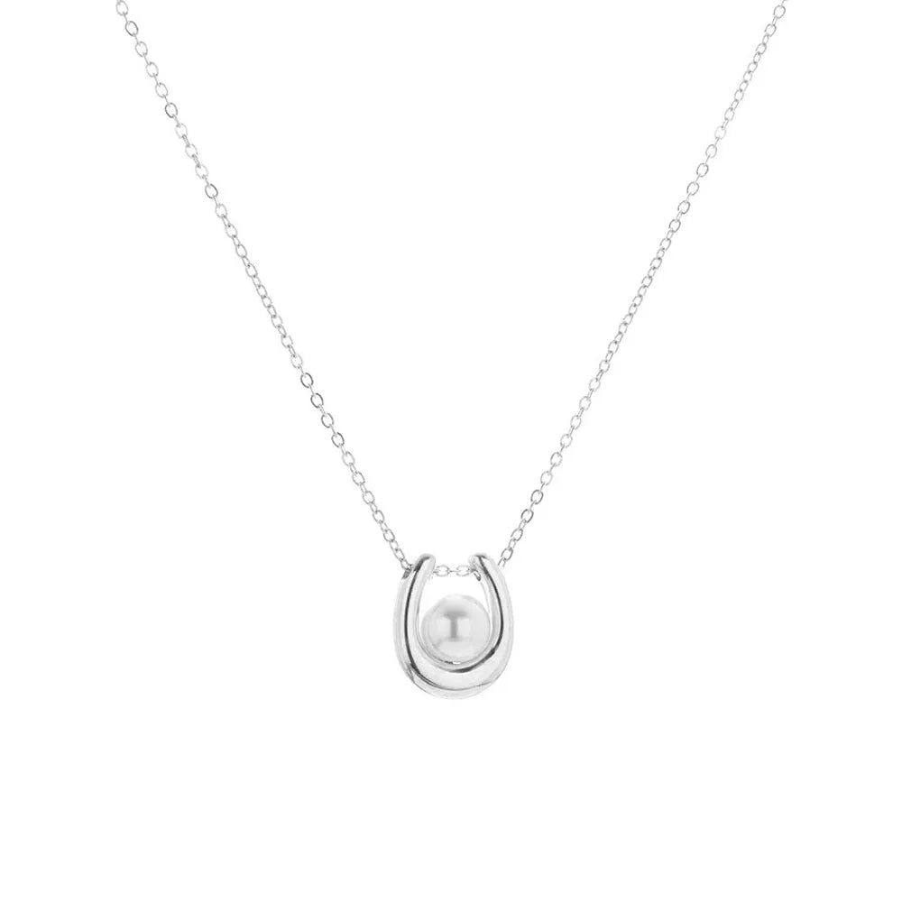 Studio shot of the S925 pure silver U-shaped pendant necklace with a pearl on a white background.