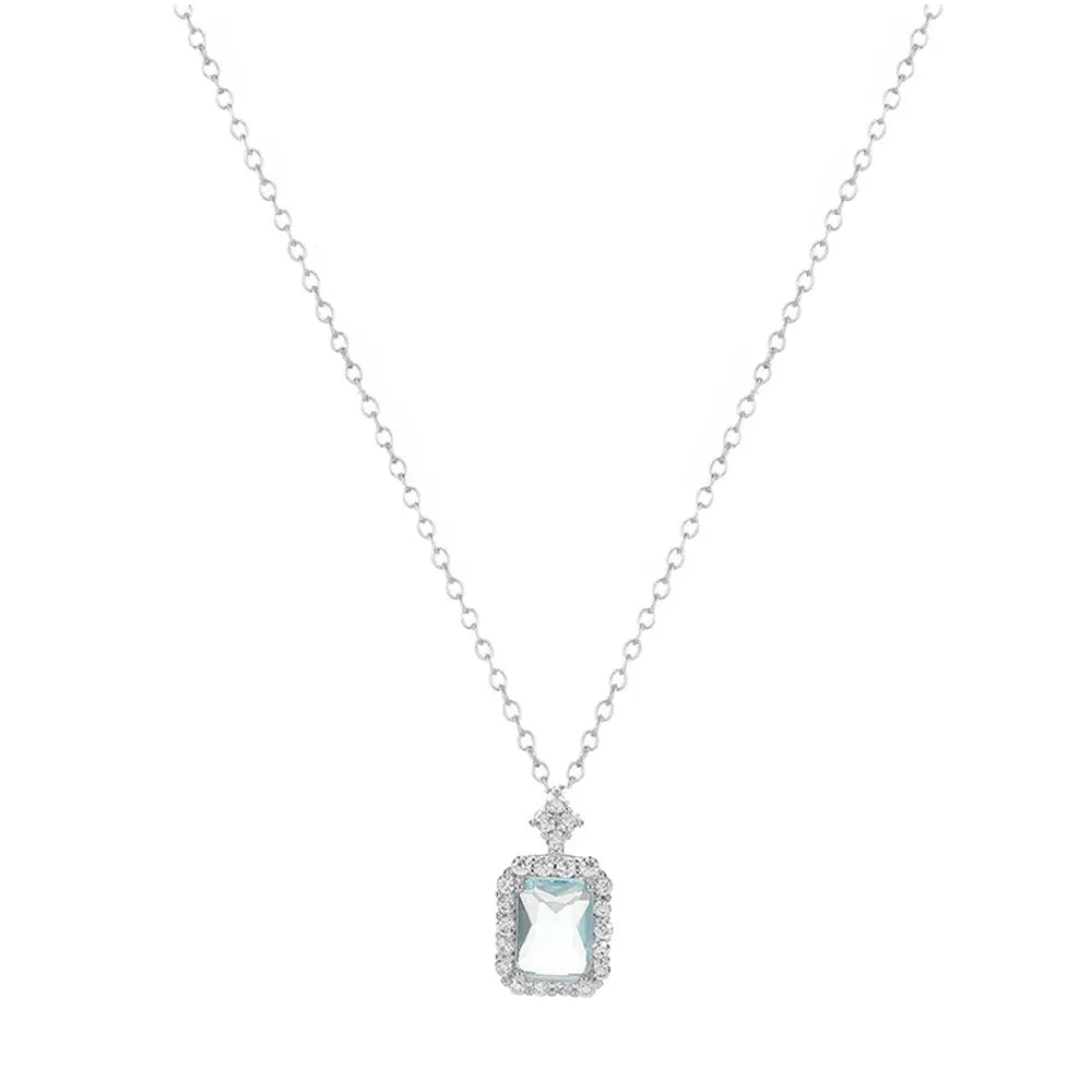 S925 sterling silver necklace featuring a rectangular aquamarine gemstone with a zircon halo on a white background.