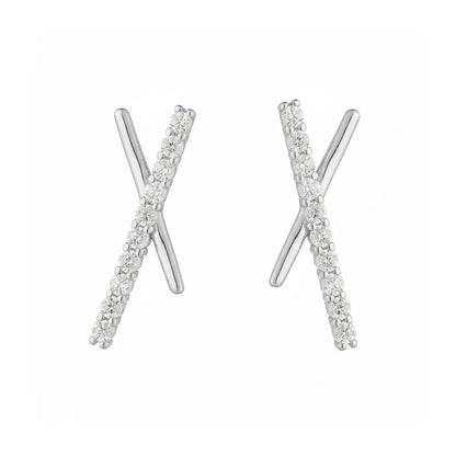 Silver geometric stud earrings with a crossover X design and pave stones.
