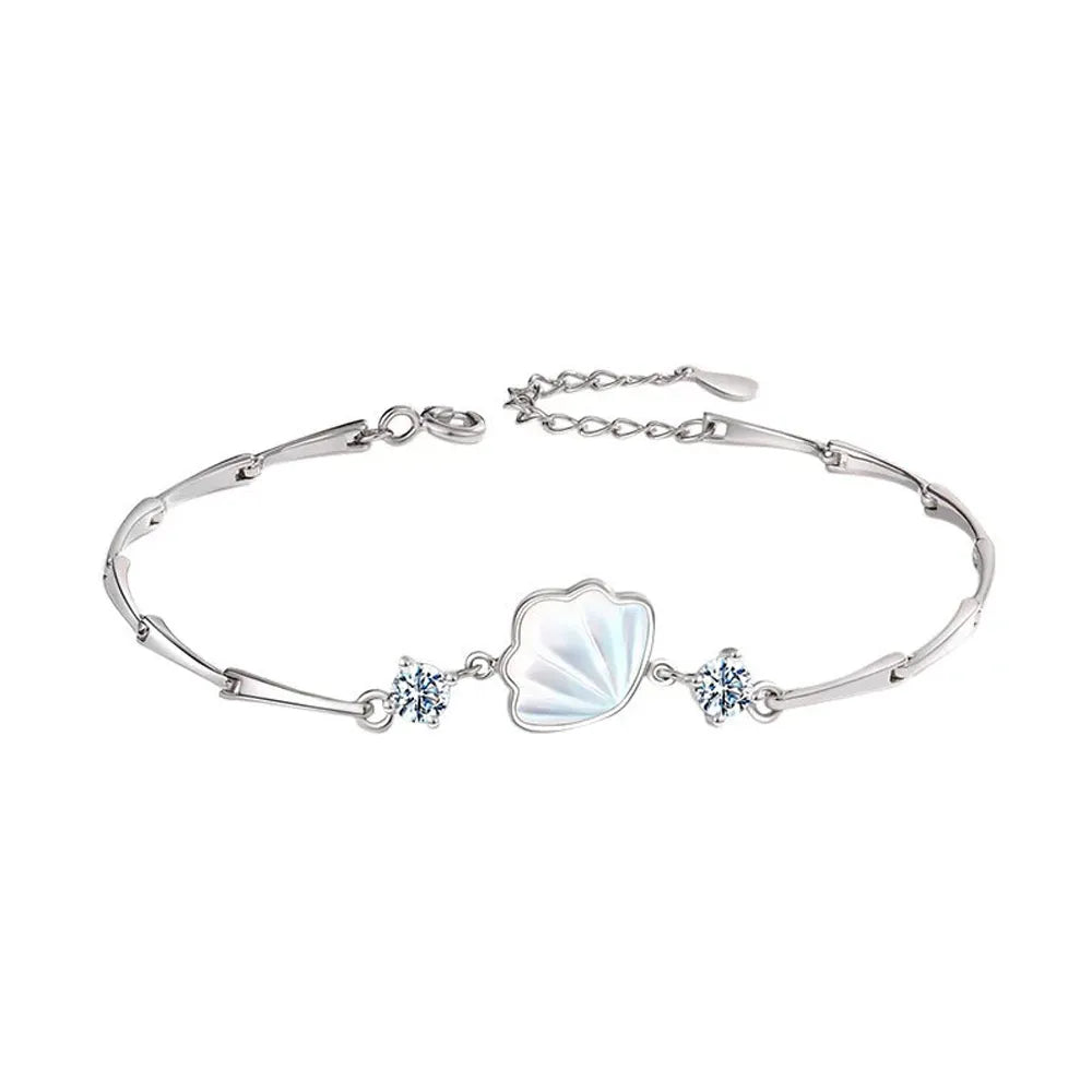 S925 sterling silver bracelet featuring a mother-of-pearl style shell charm on a unique bar link chain.