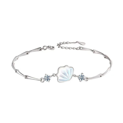S925 sterling silver bracelet featuring a mother-of-pearl style shell charm on a unique bar link chain.