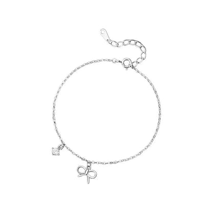 Front view of S999 fine silver bowknot zirconia bracelet, showcasing the dainty design and polished silver finish on a white background.
