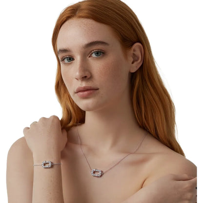 Redhead model showcasing the S925 silver oval pearl necklace and bracelet set.