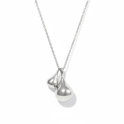Silver 316L stainless steel necklace with a sculptural double waterdrop design. High polished liquid metal look