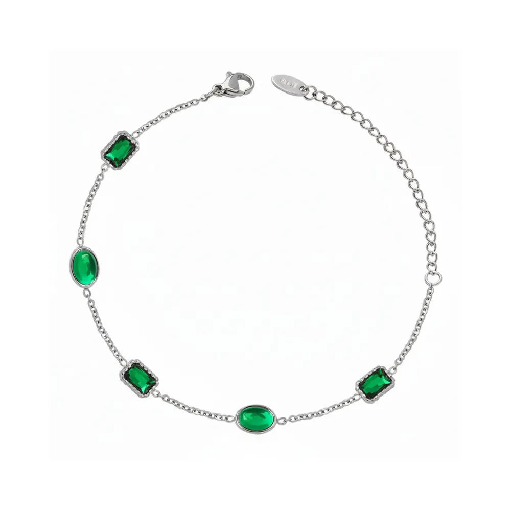 Silver 316L stainless steel bracelet set with vibrant green cubic zirconia crystals. Waterproof and tarnish-free jewelry.