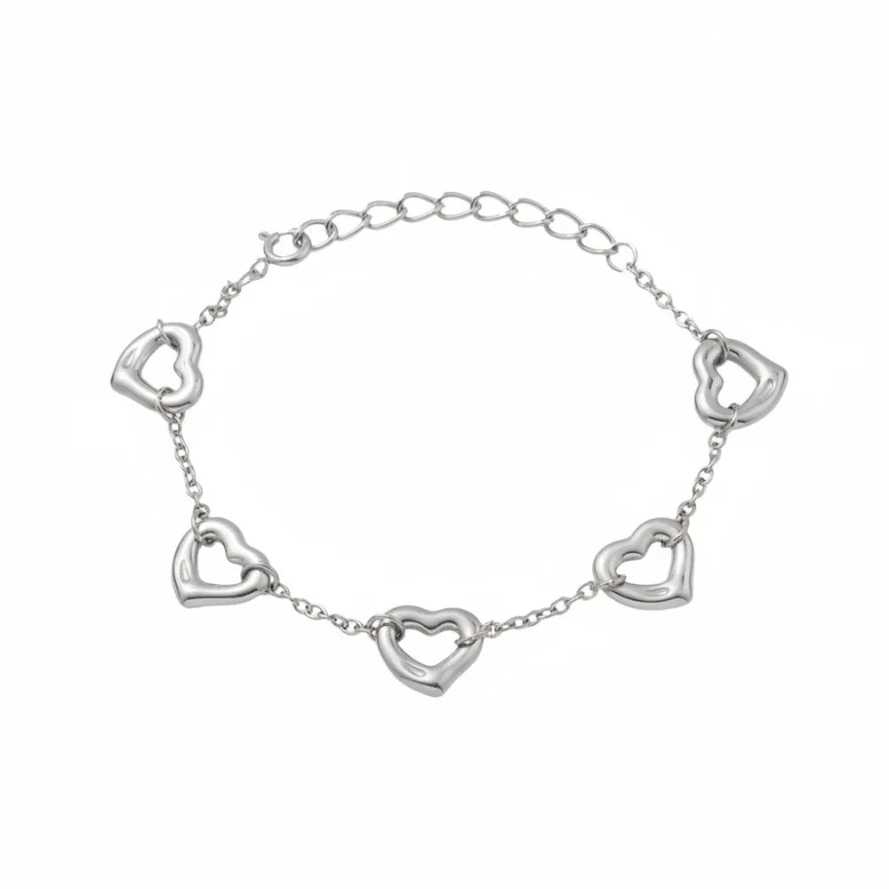 Silver 316L stainless steel bracelet with dainty open heart charms. Durable and tarnish-free jewelry on a white background.