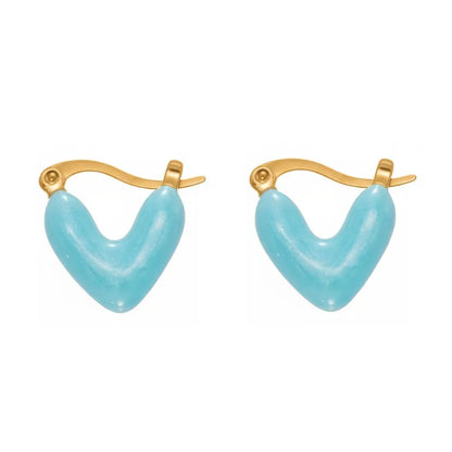 Sky blue enamel heart earrings with a glossy finish. Cute and trendy gold hoop earrings for daily wear.