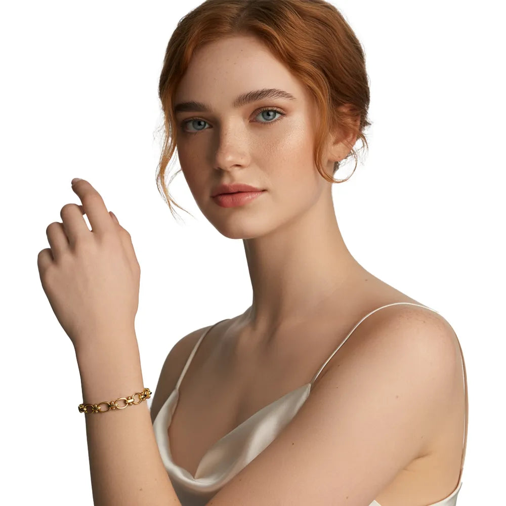 Model wearing the 18k gold Talia Textured Link Bracelet