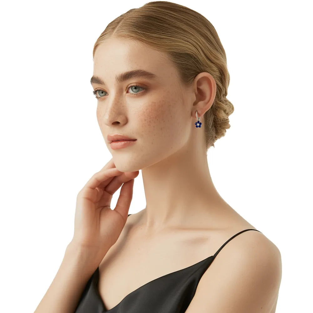 Model wearing the S925 sterling silver Azure Bloom Pavé Hoop Earrings.