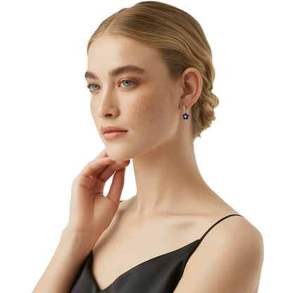 Model wearing the S925 sterling silver Azure Bloom Pavé Hoop Earrings.