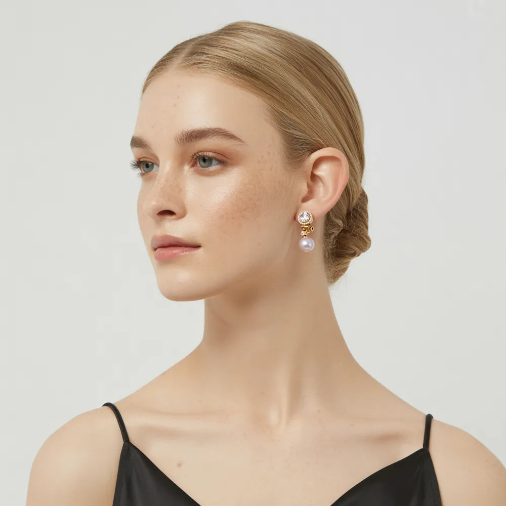 Model looking forward while wearing the sophisticated Eleonora Pearl &amp; Zirconia Clip-On Earrings