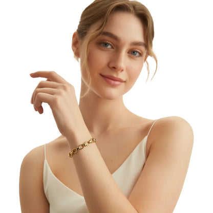 Model with red hair wearing the Talia Textured Link Bracelet, showing its elegant style.